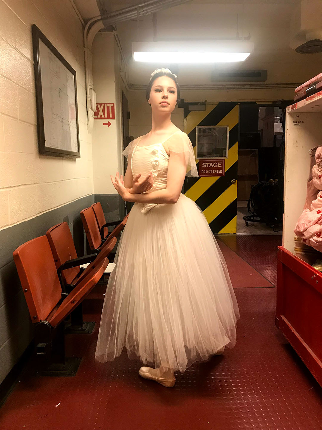 Sierra Armstrong in costume as a Wili in Giselle, backstage at the Metropolitan Opera House in 2018. Photo courtesy of Sierra Armstrong.